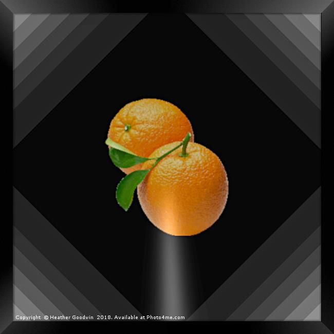 Orange on Black Framed Print by Heather Goodwin