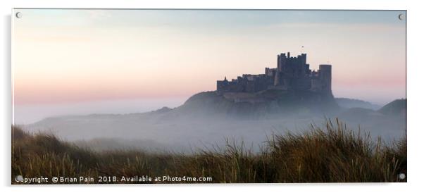 Bamburgh castle at dawn Acrylic by Brian Pain