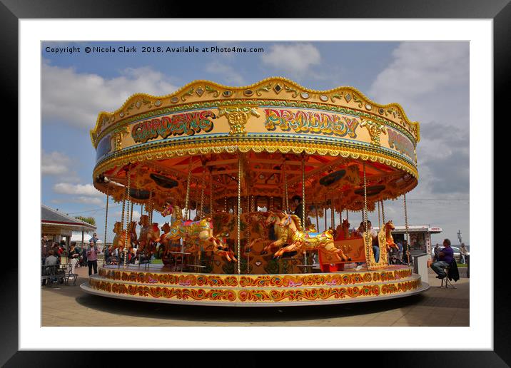 Merry Go Round Framed Mounted Print by Nicola Clark
