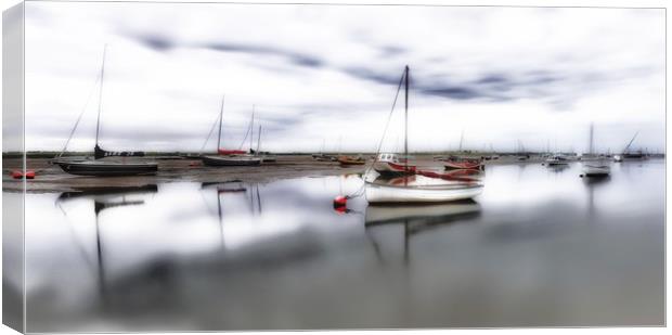 Low tide at Brancaster Staithe in Norfolk  Canvas Print by Gary Pearson