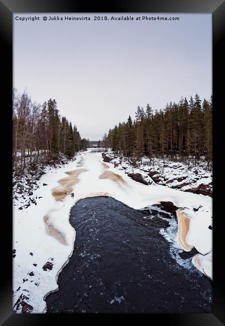 Waves In The Freezing River Framed Print by Jukka Heinovirta
