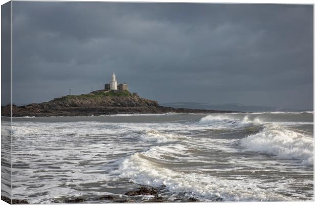 Mumbles lighthouse viewed from Bracelet bay. Canvas Print by Bryn Morgan