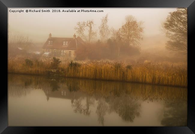 A cottage and reflection on misty winter's morning Framed Print by Richard Smith