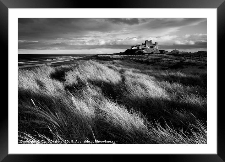 Bamburgh Castle (in Mono) Northumberland, England Framed Mounted Print by Chris Drabble