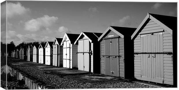 Black and White Beach Huts Canvas Print by Louise Godwin