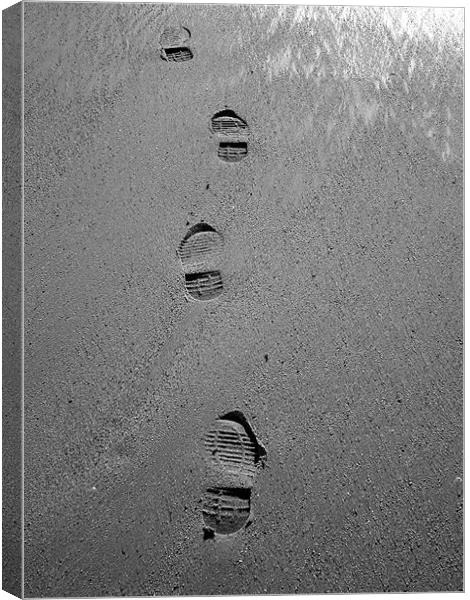 Footprints In The Sand Canvas Print by kelly Draper