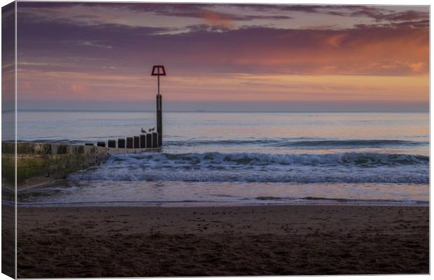 Sunset over Bournemouth beach Canvas Print by Steve Mantell