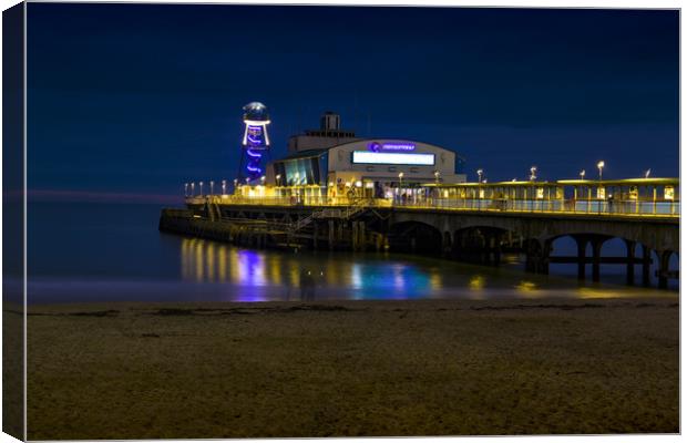 Bournemouth pier at night Canvas Print by Steve Mantell