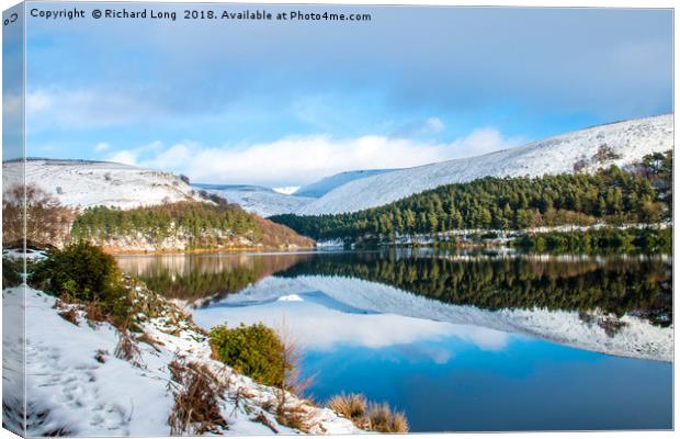 Snowy Winter Reflections at The Derwent Dam, Peak  Canvas Print by Richard Long