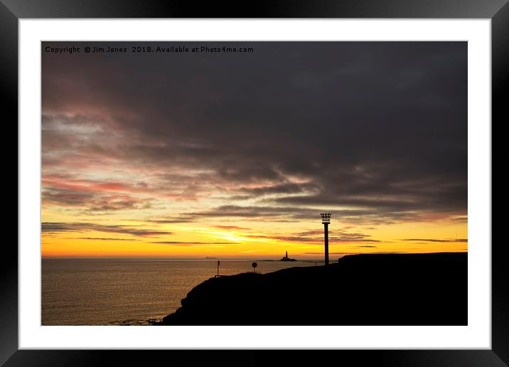 Beacon silhouetted against a dawn sky Framed Mounted Print by Jim Jones