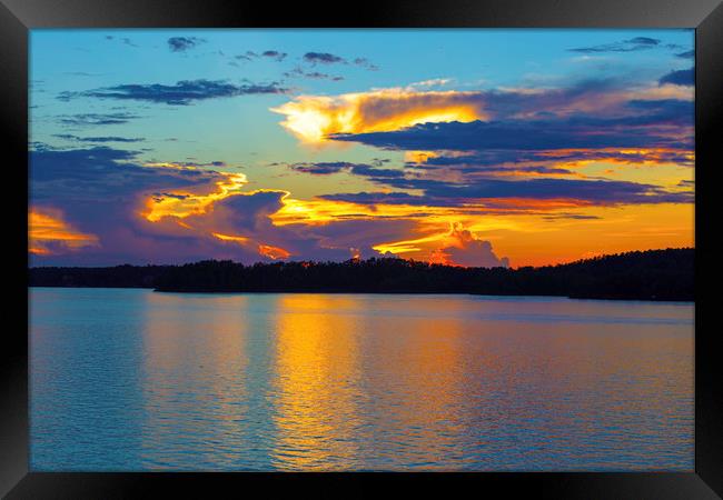 Sunset after the storm Framed Print by Mark Draper