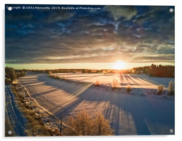 Sun Rising Over The Frozen River Acrylic by Jukka Heinovirta