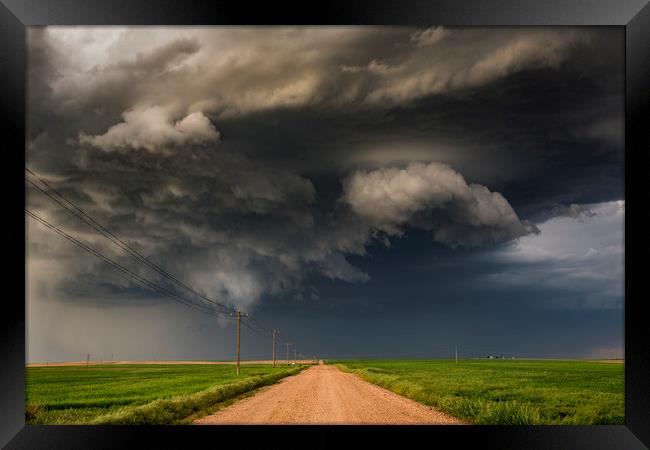 Rotating thunderstorm, Nebraska. Framed Print by John Finney