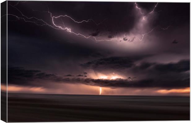 Lightning Lights up the sky over Colorado Canvas Print by John Finney