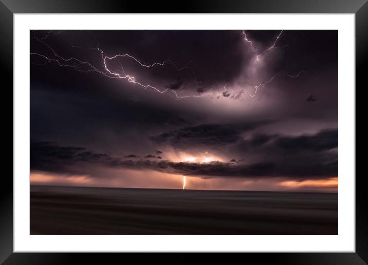 Lightning Lights up the sky over Colorado Framed Mounted Print by John Finney