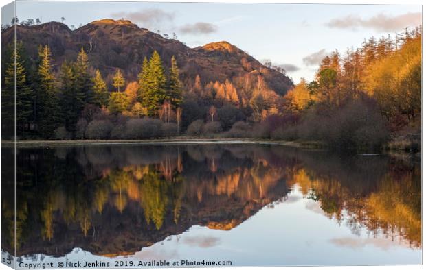 Evening Reflections at Yew Tree Tarn Lake District Canvas Print by Nick Jenkins