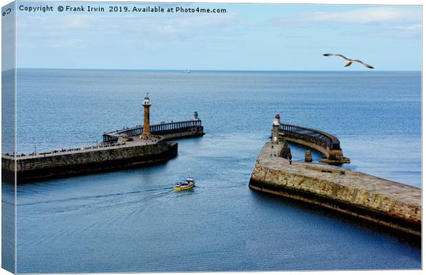 A small boat leaving Whitby Harbour Canvas Print by Frank Irwin