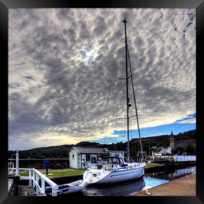 Yacht under a Dappled Sky Framed Print by Tom Gomez