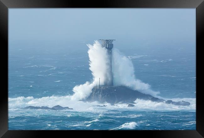 Storm Diana crashing into the Longships Lighthouse Framed Print by CHRIS BARNARD