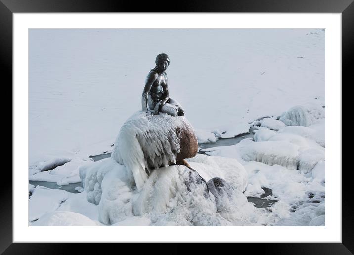 Frozen canal near statue of The Little Mermaid in  Framed Mounted Print by Dalius Baranauskas