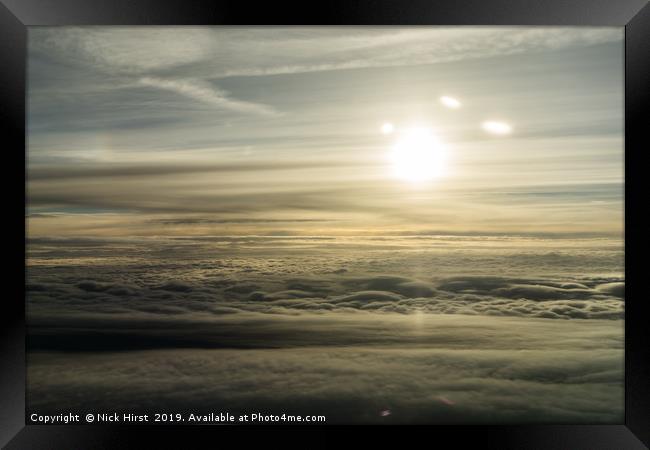 Sunrise form above the clouds Framed Print by Nick Hirst