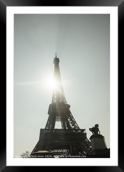 Sun shining through the Eiffel Tower Framed Mounted Print by Nick Hirst
