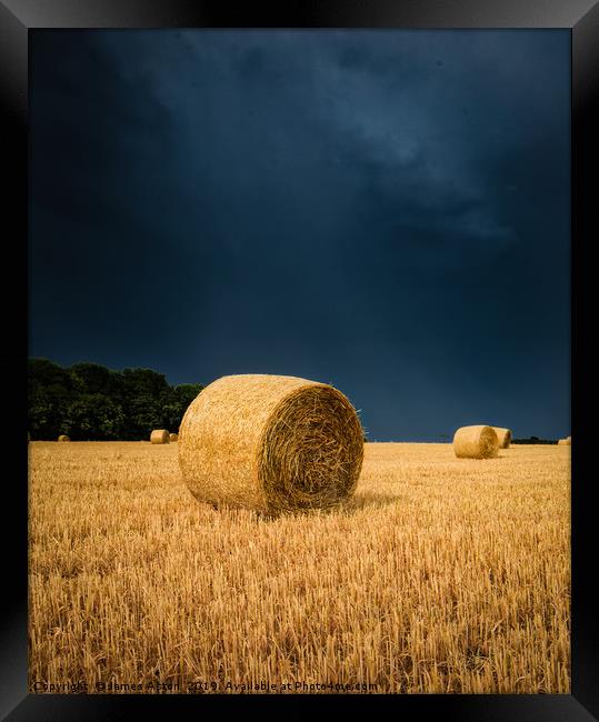 Summer Thunder Storm over the Hay bails Framed Print by James Aston