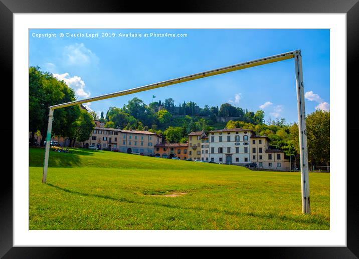 The street into the goal posts Framed Mounted Print by Claudio Lepri