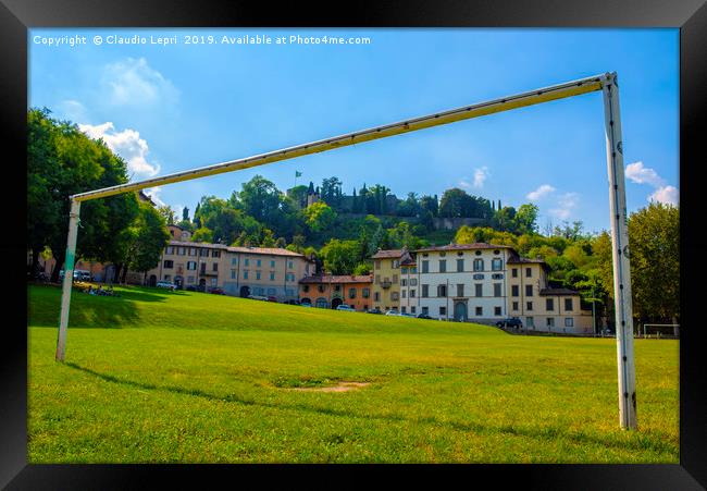 The street into the goal posts Framed Print by Claudio Lepri