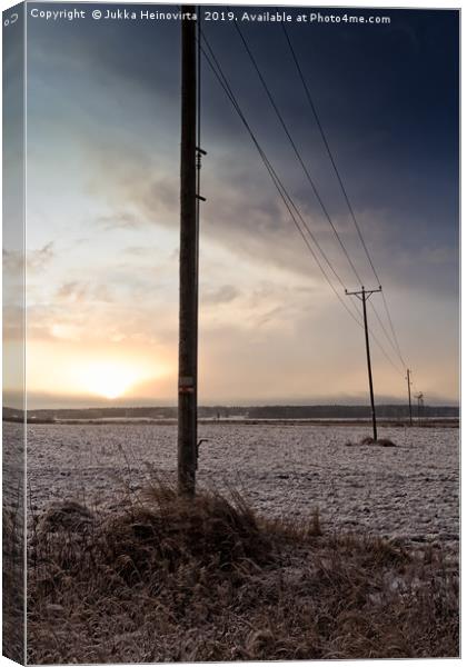 Telephone Lines Crossing The Fields Canvas Print by Jukka Heinovirta