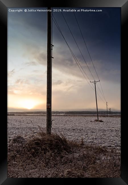 Telephone Lines Crossing The Fields Framed Print by Jukka Heinovirta