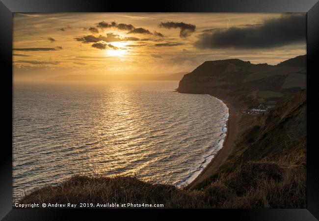 Towards the Golden Cap and setting sun Framed Print by Andrew Ray