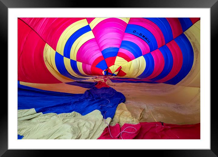 Hot air balloon inflation Framed Mounted Print by Tony Bates