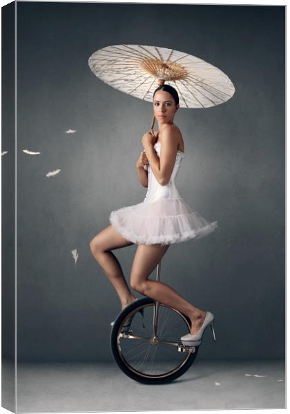 Lady on a unicycle Canvas Print by Johan Swanepoel