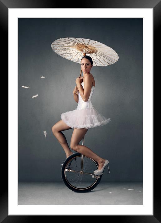 Lady on a unicycle Framed Mounted Print by Johan Swanepoel