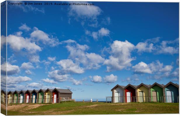 Colourful beach huts at Blyth Canvas Print by Jim Jones
