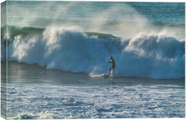 Riding the Waves at Woolacombe Canvas Print by Eric Pearce AWPF