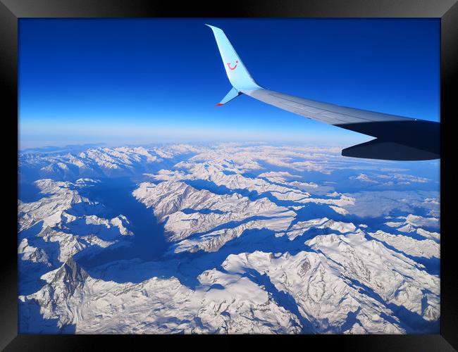 Flying high over the Alps Framed Print by mark humpage