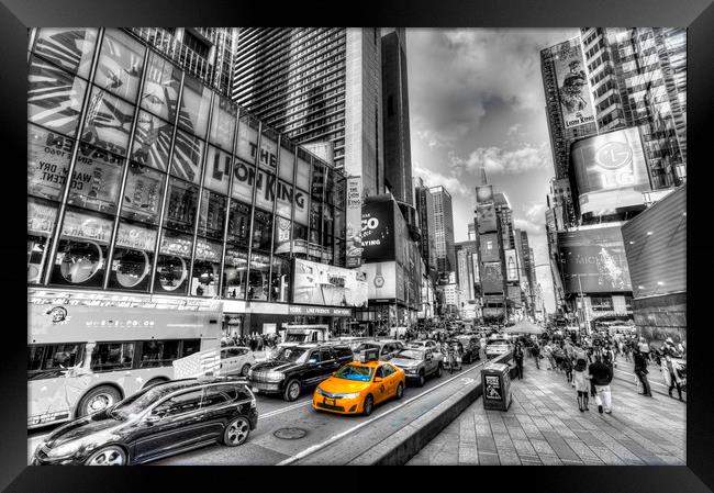 Times Square Yellow Cab Framed Print by David Pyatt