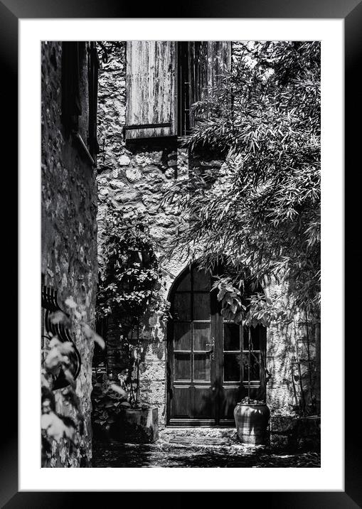 A Shadowy alley in Saint Paul de Vence France Framed Mounted Print by Maggie McCall
