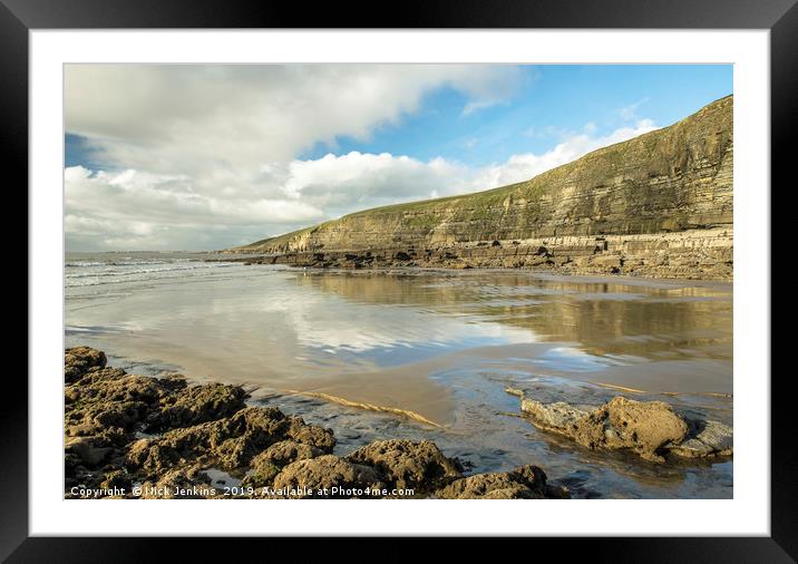 Dunraven Bay with clouds reflected on wet sand Framed Mounted Print by Nick Jenkins