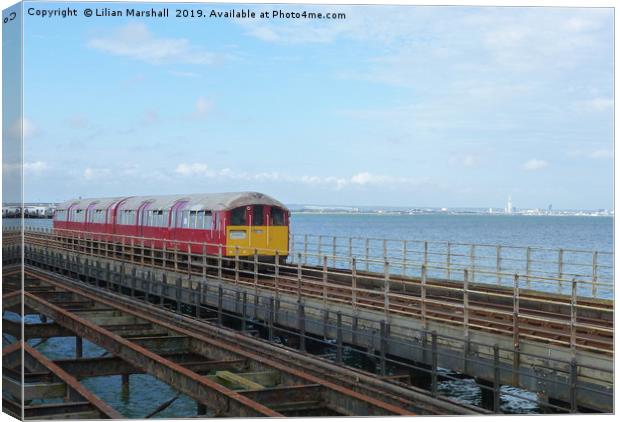 Train on Ryde Pier. Canvas Print by Lilian Marshall
