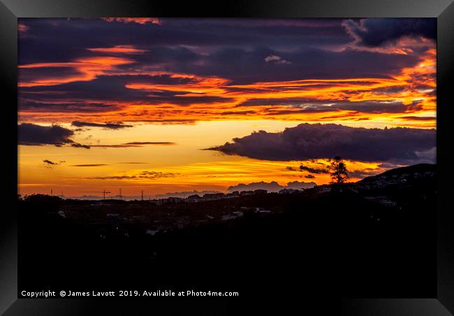 Angry Sky Over Mijas Framed Print by James Lavott