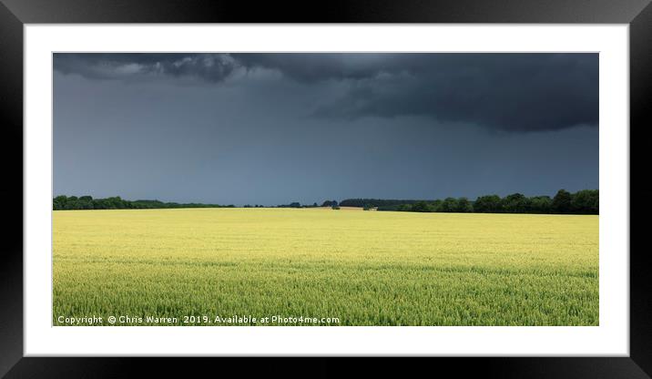 Crops under dark thunder skies  Framed Mounted Print by Chris Warren
