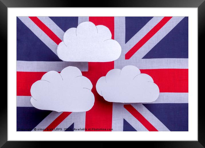 British flag with three white clouds floating abov Framed Mounted Print by Simon Bratt LRPS