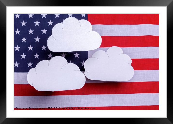 American flag with three white clouds floating abo Framed Mounted Print by Simon Bratt LRPS