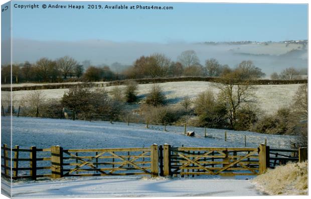 Snowy land scape  looking towards Mow cop castle  Canvas Print by Andrew Heaps
