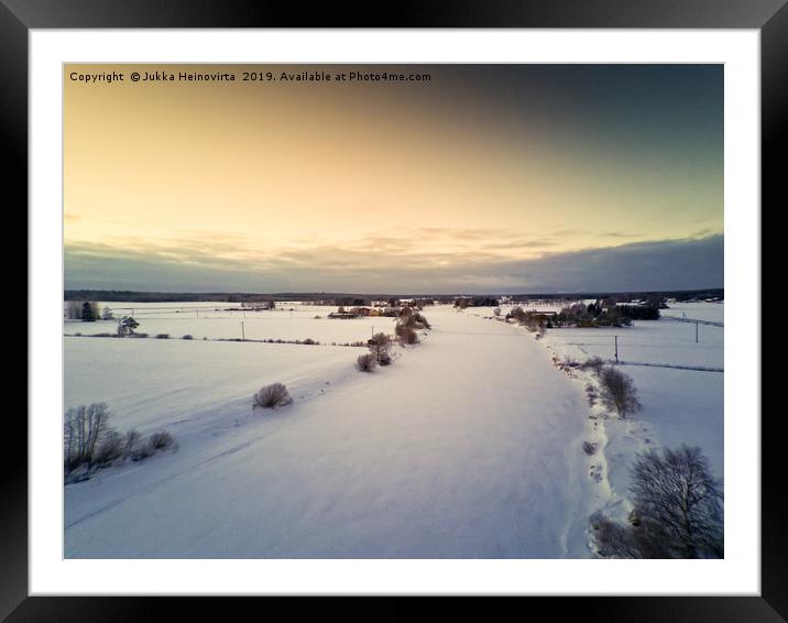 Sunset Over Icy River Bend Framed Mounted Print by Jukka Heinovirta