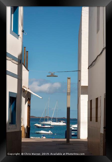 Boats in the harbour Corralejo Fuerteventura Framed Print by Chris Warren