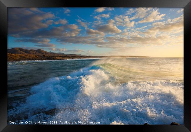 Wind blowing the surf El Cotillo Fuerteventura  Framed Print by Chris Warren